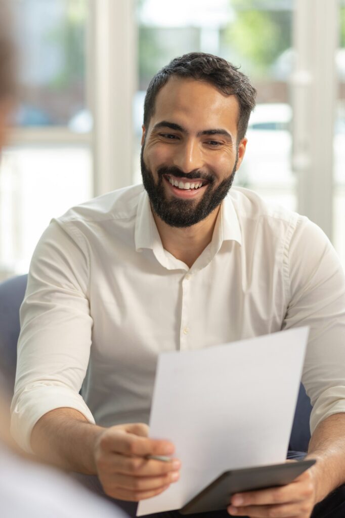 Portrait of handsome man that reading agreement